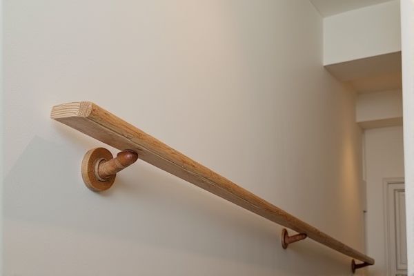 Newel Post vs. Wall-Mounted Handrail in Basement: Which Is Better?